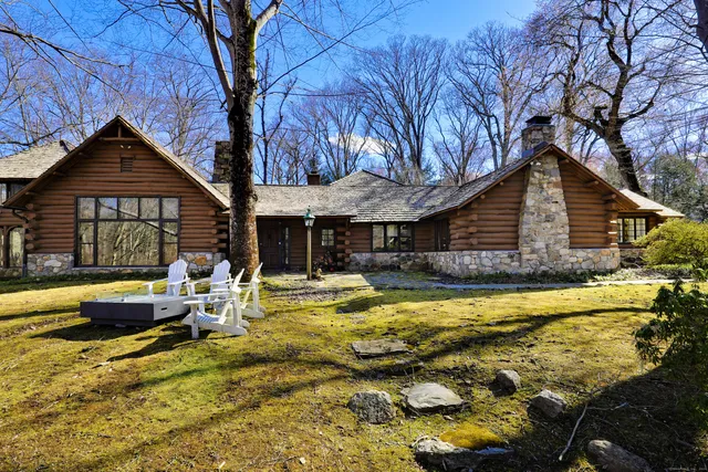a view of swimming pool with outdoor seating