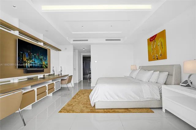 a white bath tub sitting in a bathroom