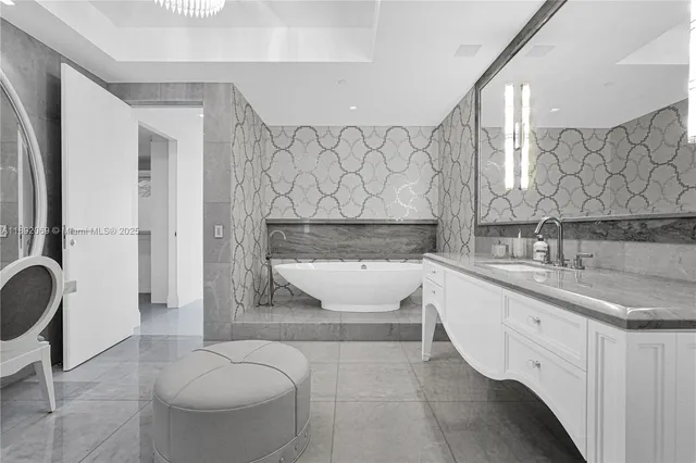 a living room with fireplace furniture and a flat screen tv