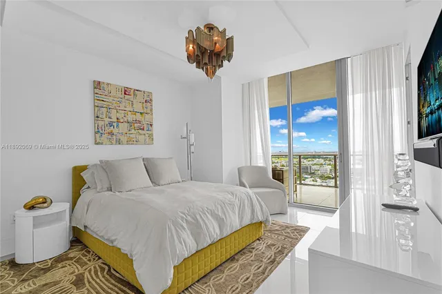 a bedroom with a bed and furniture