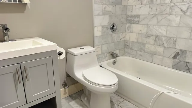a bathroom with a sink and a toilet