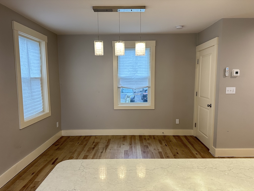 39 Snow Street, Unit SINGLE Boston, MA 02135 - Photo 5 of 28 a view of an empty room