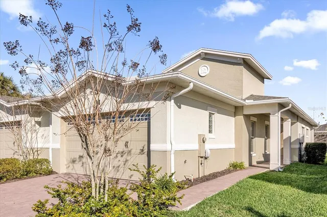a view of a building with a yard