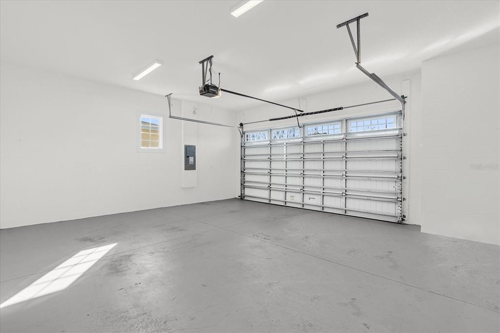 2360 Datura Loop St. Cloud, FL 34772 - Photo 22 of 46 a view of a garage