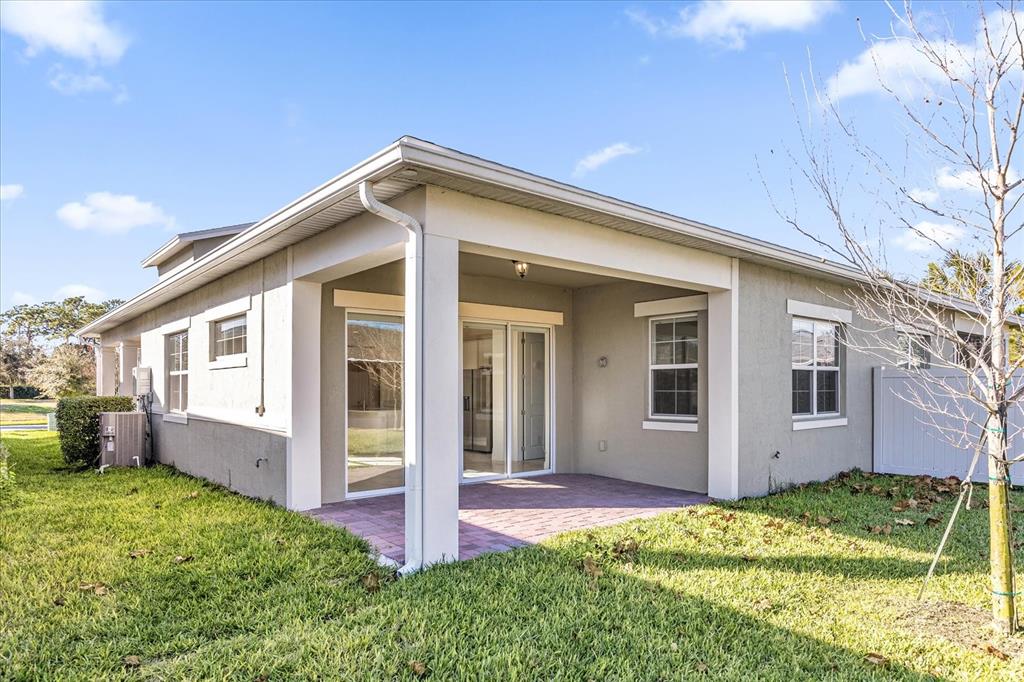 2360 Datura Loop St. Cloud, FL 34772 - Photo 26 of 46 a view of a house with backyard