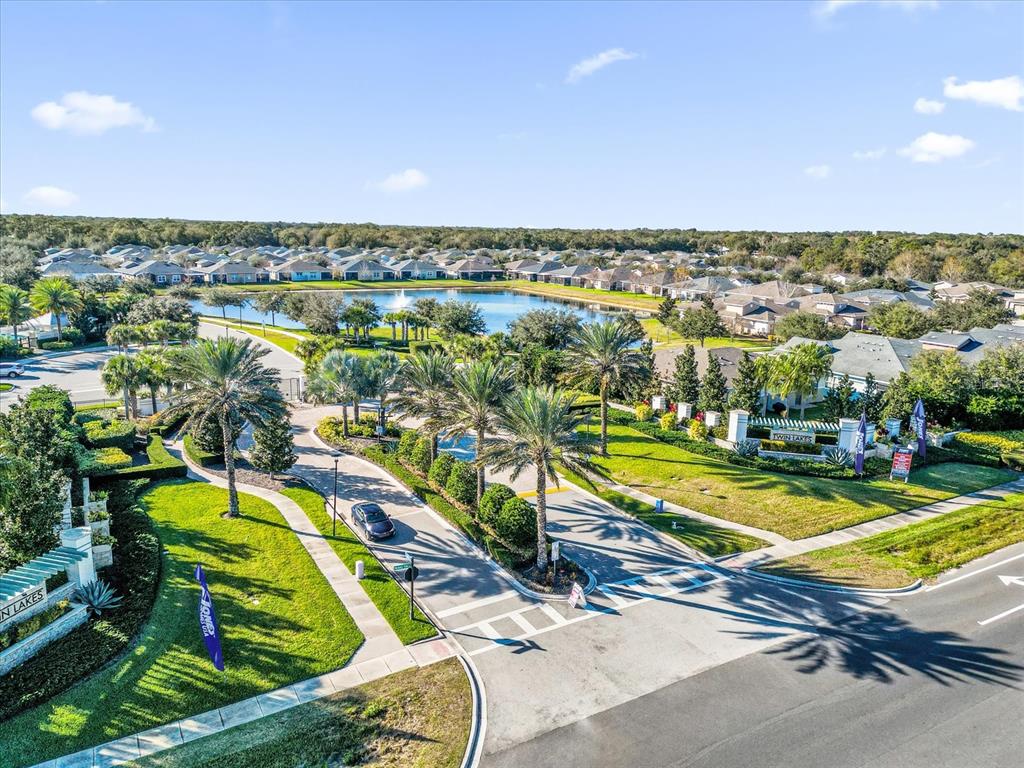 2360 Datura Loop St. Cloud, FL 34772 - Photo 37 of 46 an aerial view of a tennis ground and a cars park