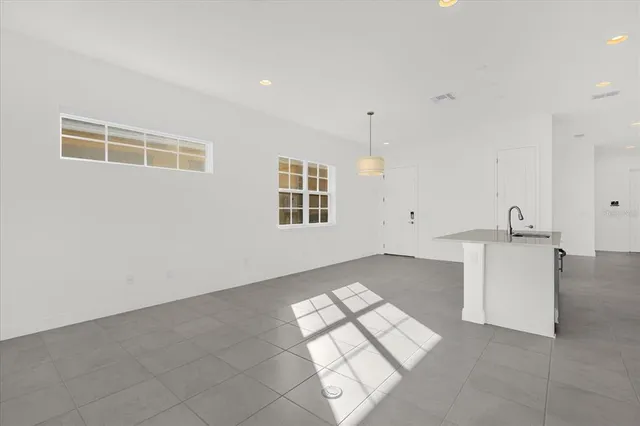 a view of kitchen and windows