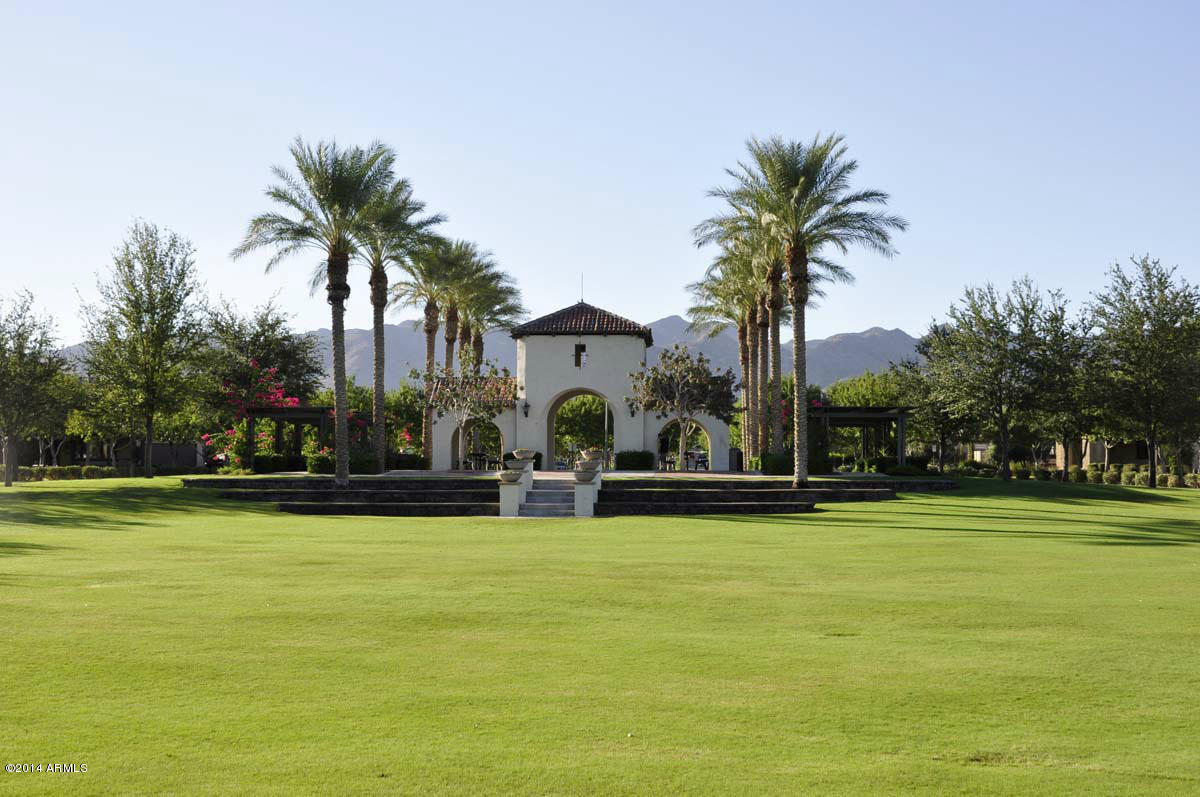 2304 North Alsap Road Buckeye, AZ 85396 - Photo 26 of 27 a front view of house with yard and palm tree
