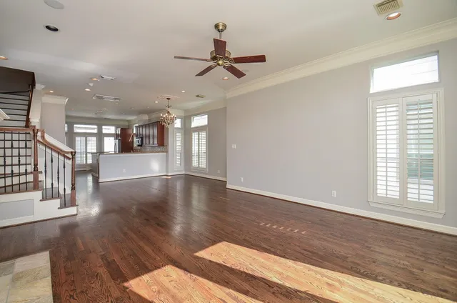 a view of an entryway with wooden floor
