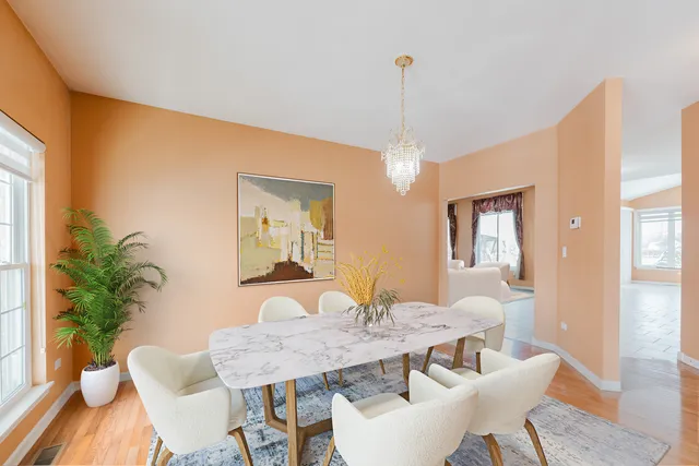 a living room with fireplace furniture and a flat screen tv