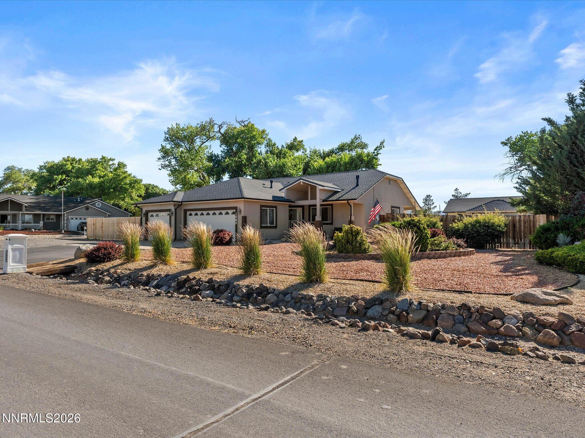 1080 Red Rock Road Fernley, NV 89408 - Photo 3 of 45 front view of a house with a street