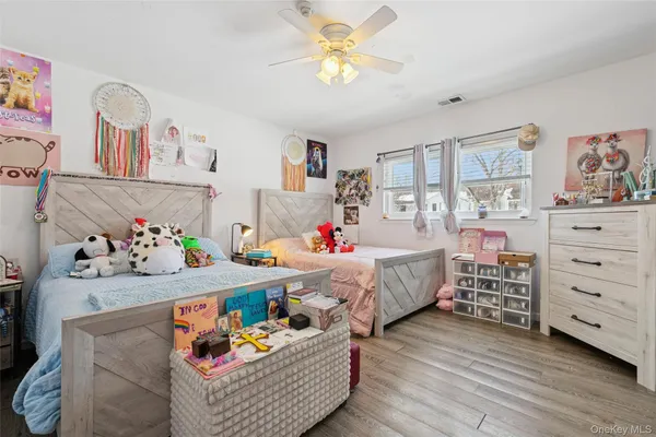 a bed room with a bed and a baby crib