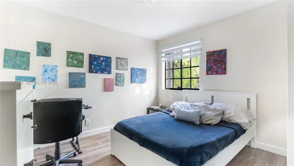 a living room with furniture and window