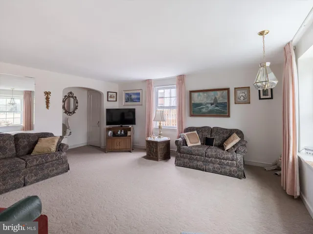 a living room with furniture and a couch