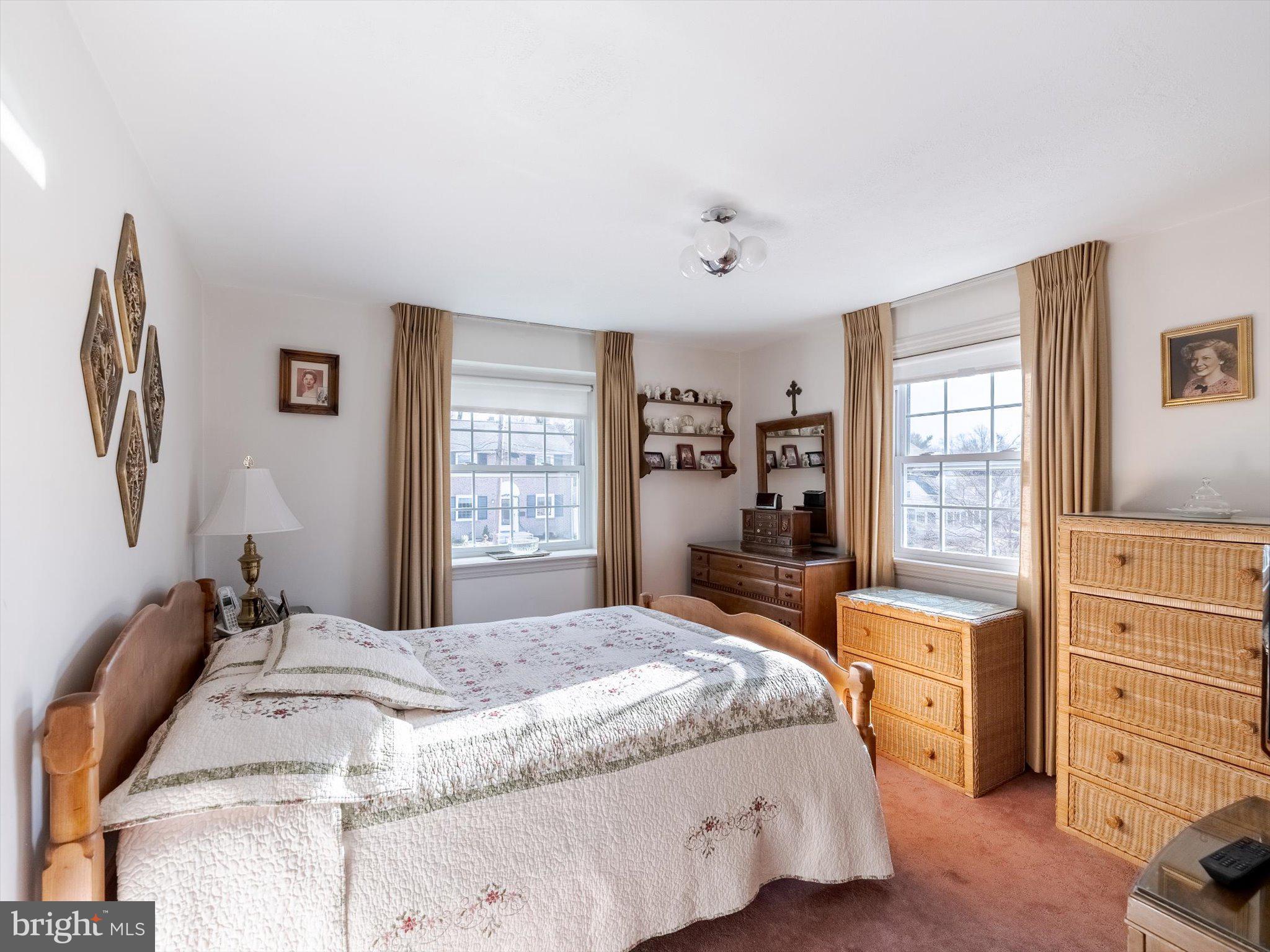 34 Schuyler Road Springfield, PA 19064 - Photo 22 of 30 a bedroom with a large bed and a window