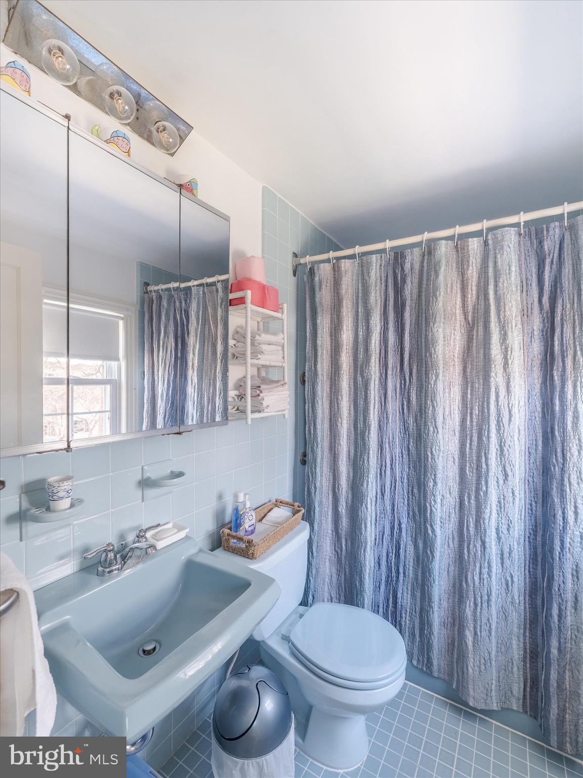 34 Schuyler Road Springfield, PA 19064 - Photo 25 of 30 a bathroom with a sink toilet and shower