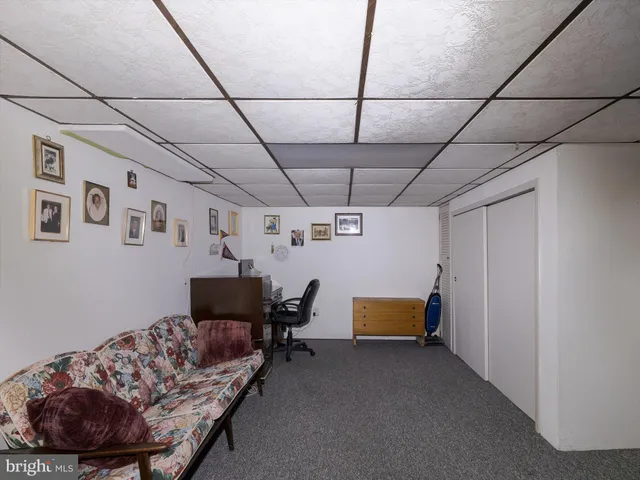 a bedroom with furniture and a couch