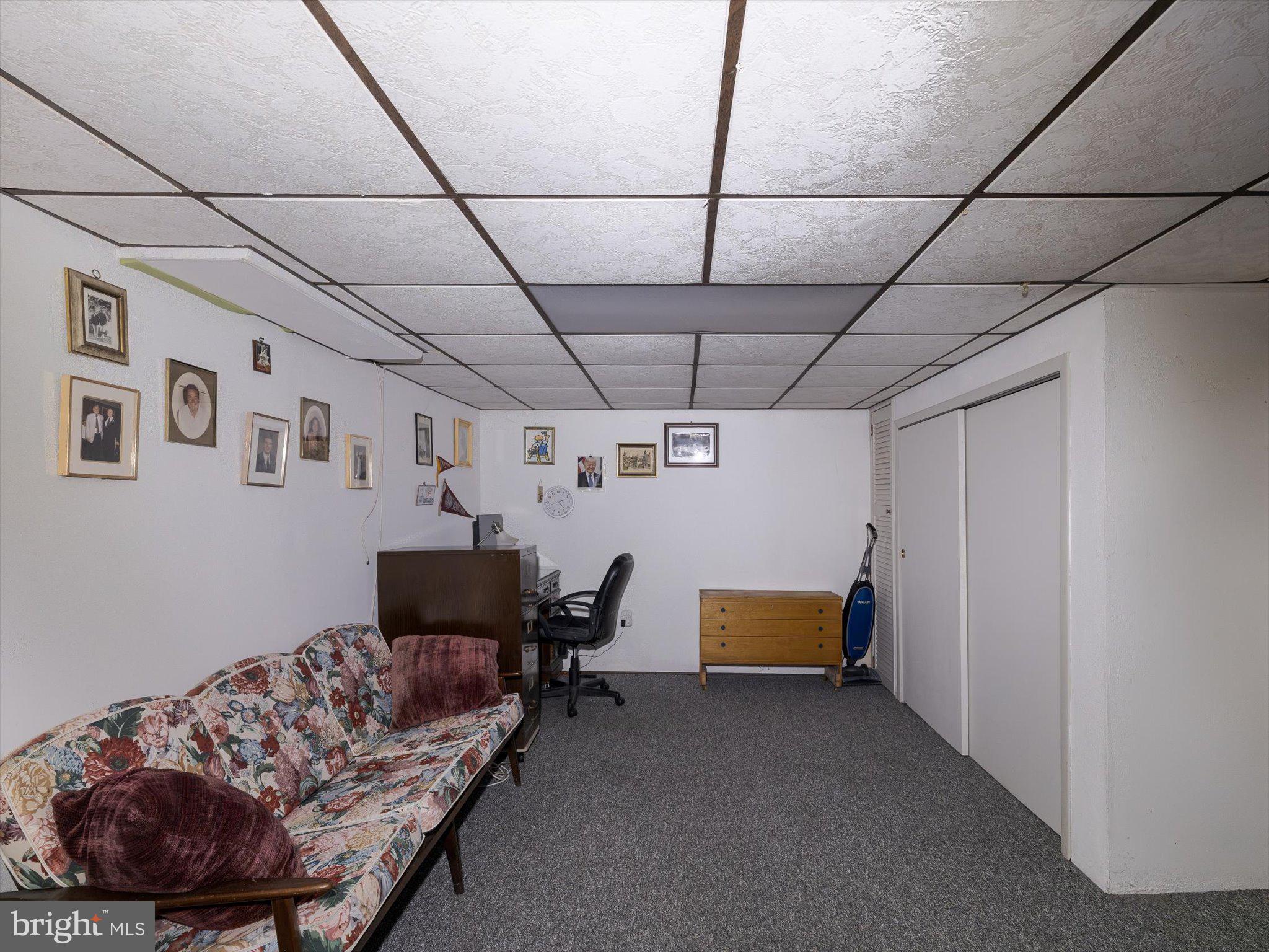 34 Schuyler Road Springfield, PA 19064 - Photo 26 of 30 a bedroom with furniture and a couch