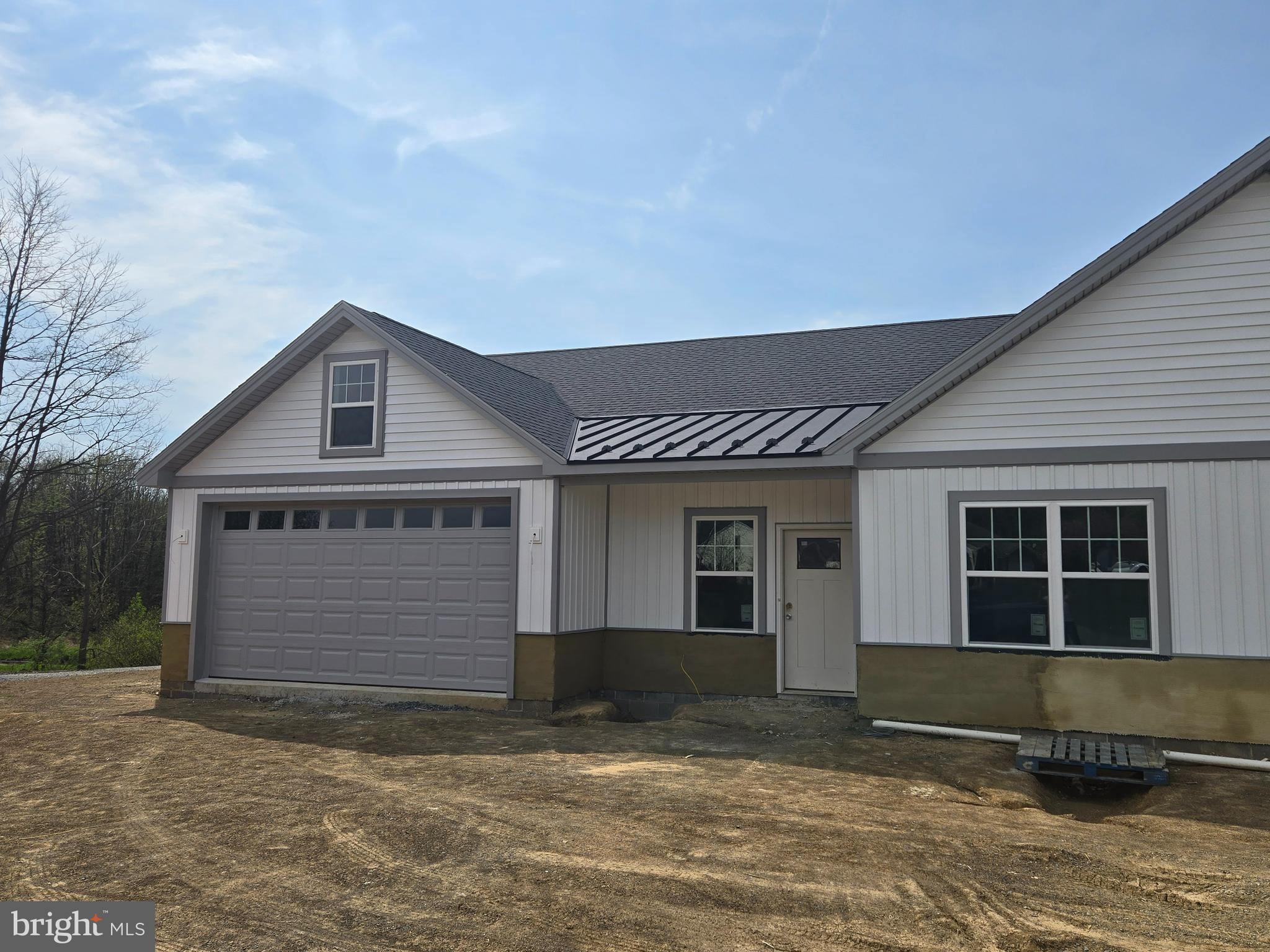 2499 Echo Springs Road Chambersburg, PA 17202 - Photo 1 of 1 a front view of a house with a yard