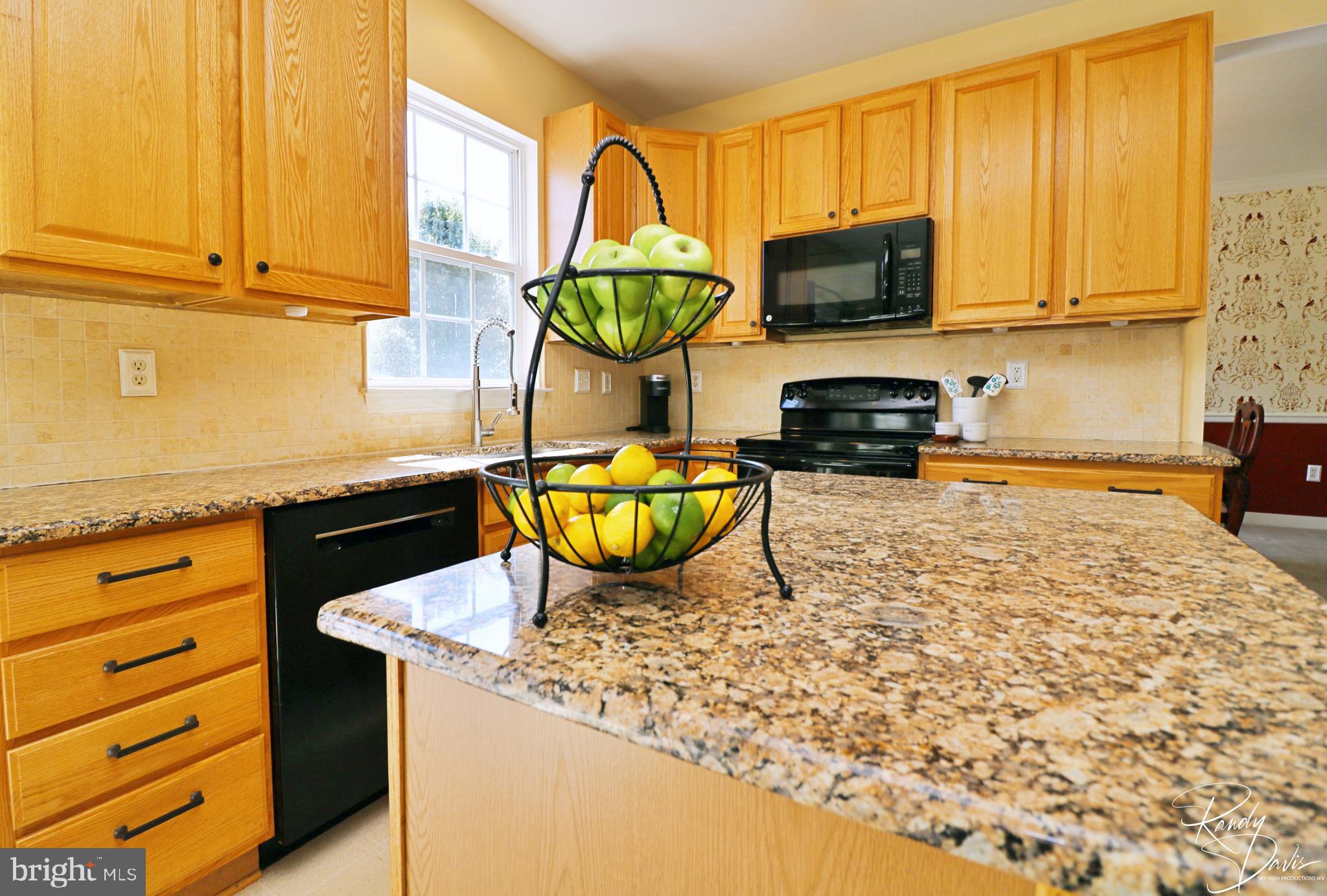 66 Watercourse Drive Ranson, WV 25438 - Photo 23 of 82 Kitchen with Granite Countertops