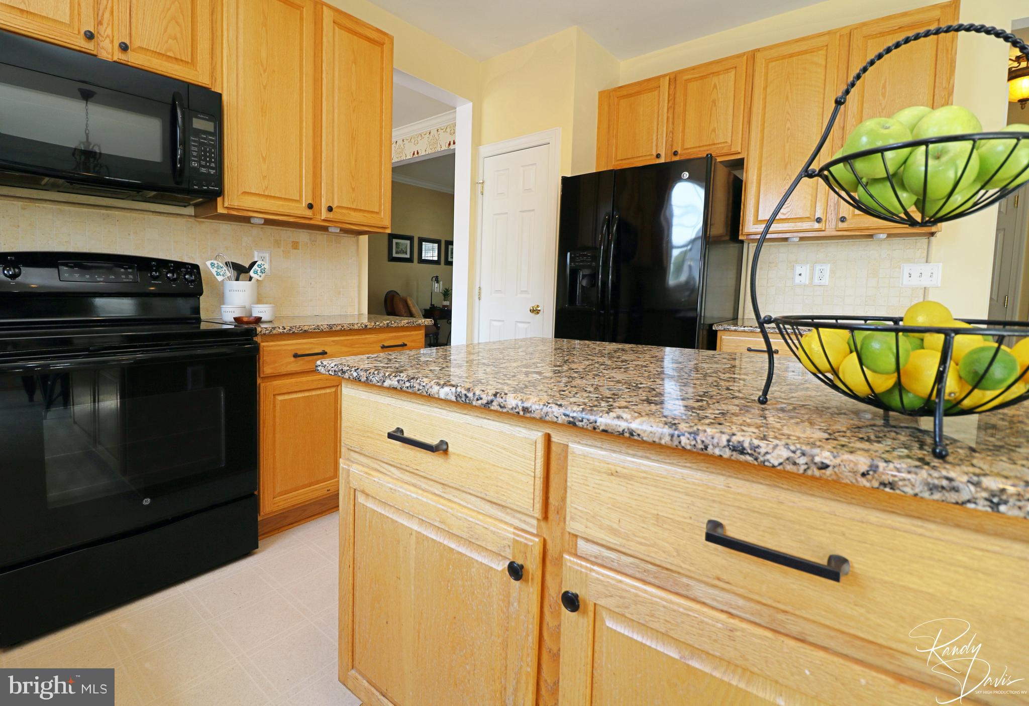 66 Watercourse Drive Ranson, WV 25438 - Photo 25 of 82 Kitchen with Granite Countertops