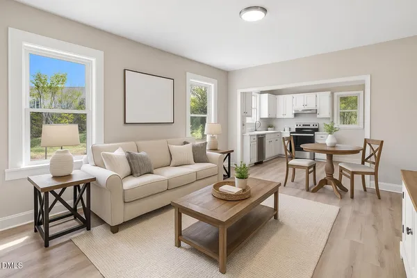 a living room with furniture and a window