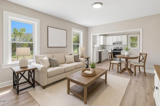 a living room with furniture and a window