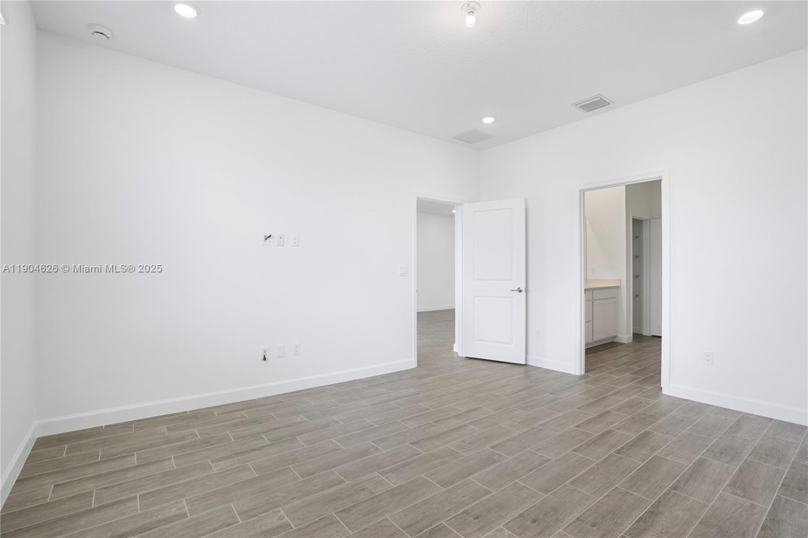 19655 Barn Swallow Way, Unit 19655 West Palm Beach, FL 33470 - Photo 17 of 59 a view of an empty room