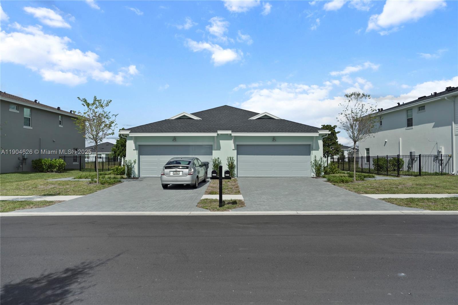 19655 Barn Swallow Way, Unit 19655 West Palm Beach, FL 33470 - Photo 2 of 59 a car parked in front of a house
