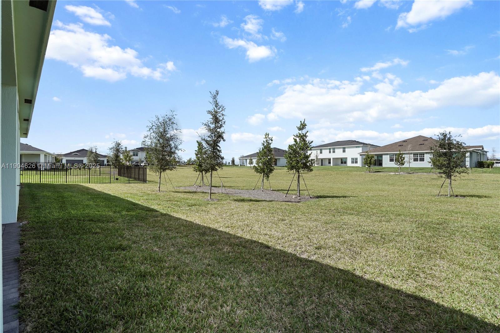 19655 Barn Swallow Way, Unit 19655 West Palm Beach, FL 33470 - Photo 36 of 59 a view of an outdoor space and yard