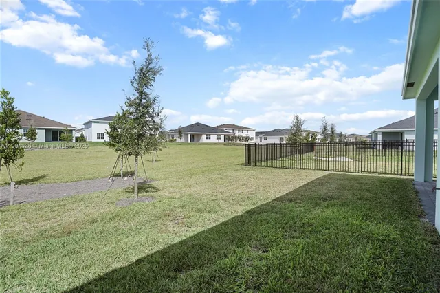 a view of a house with a park