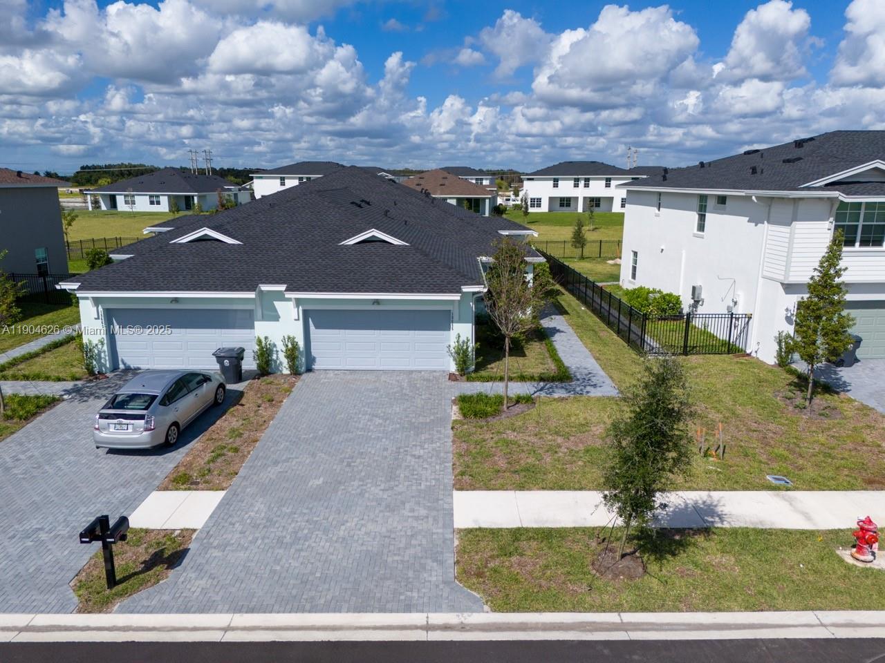 19655 Barn Swallow Way, Unit 19655 West Palm Beach, FL 33470 - Photo 42 of 59 a view of a house with a park
