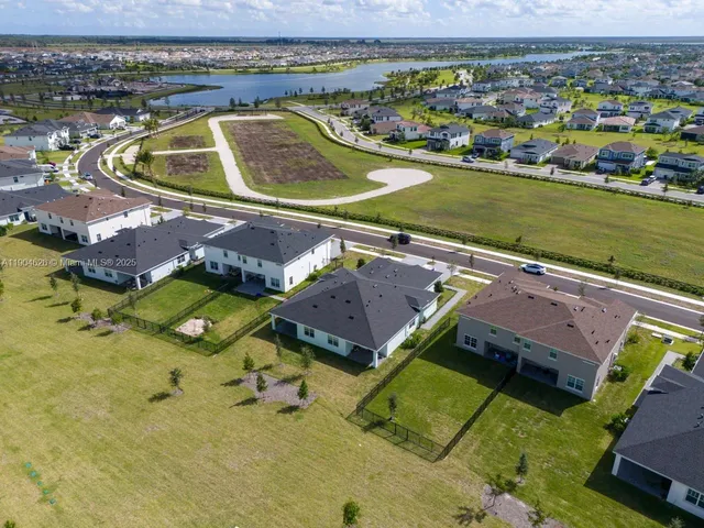 a view of a swimming pool and an outdoor space