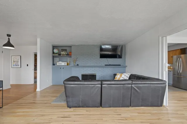 a kitchen with a sink and a stove top oven