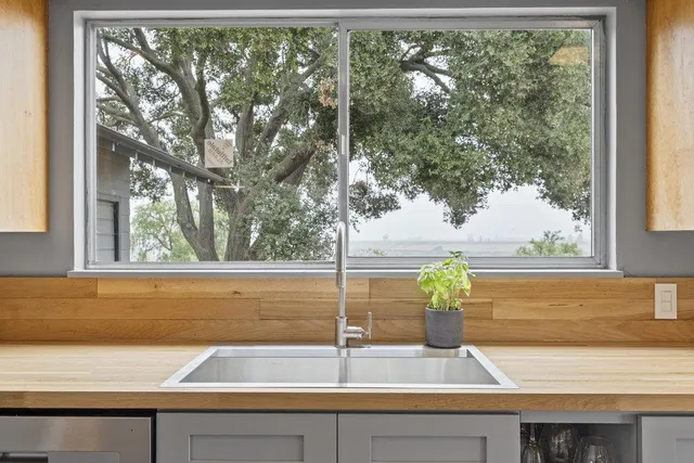 a bed room with a bed and a window