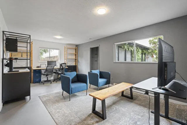 a bathroom with a sink double vanity and a mirror