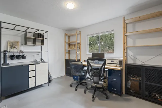 a house with garden in front of it