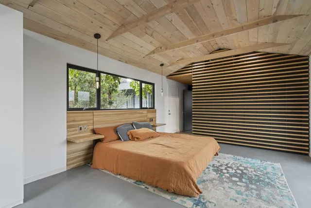 a view of backyard of house with outdoor seating