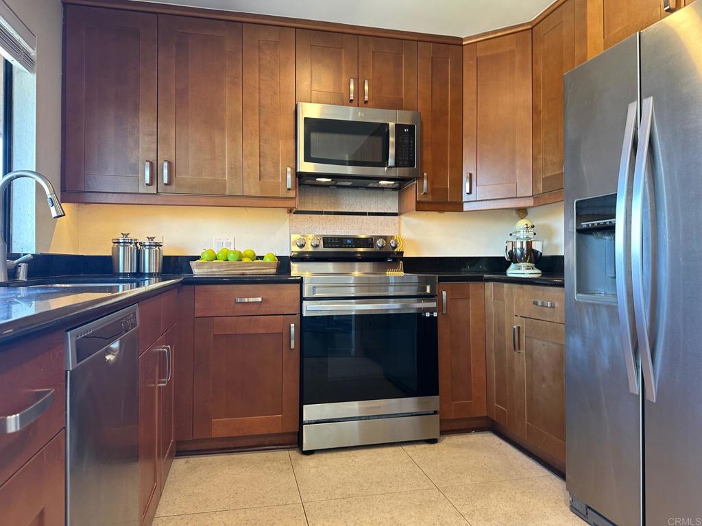 4253 Fifth Avenue San Diego, CA 92103 - Photo 7 of 22 a kitchen with a sink stove and microwave