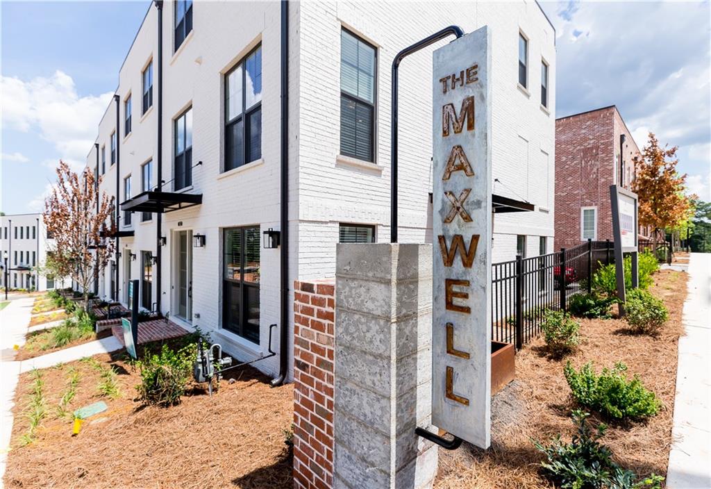 191 Devore Road Alpharetta, GA 30009 - Photo 1 of 1 a view of a brick buildings with many windows