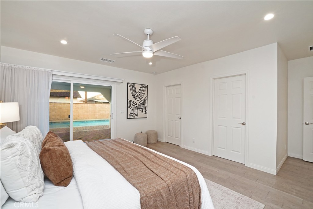 8550 Raviller Drive Downey, CA 90240 - Photo 16 of 38 Primary bedroom - access to backyard/pool