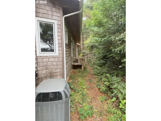 a bathroom with a toilet and shower