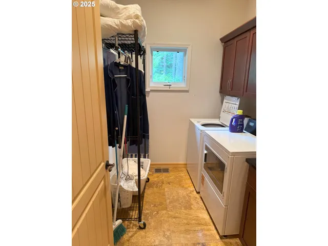 a room with a bed and a flat screen tv