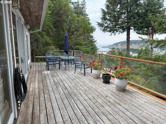 an outdoor space with furniture and potted plants