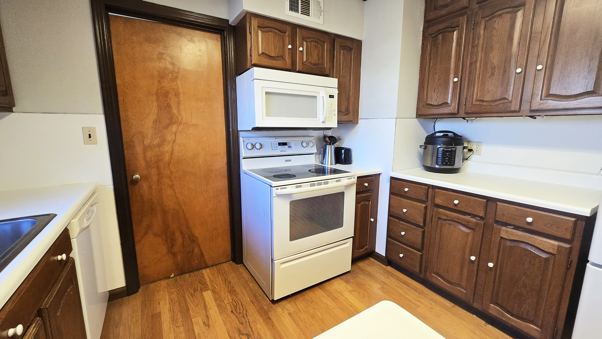 4 Lilac Lane Centralia, IL 62801 - Photo 13 of 32 a kitchen with stainless steel appliances white cabinets and a sink