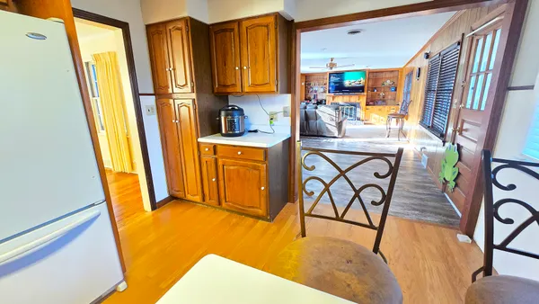 a view of living room with furniture and a window