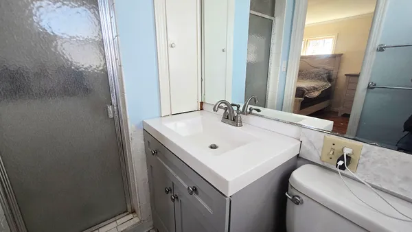 a bathroom with a sink and a toilet