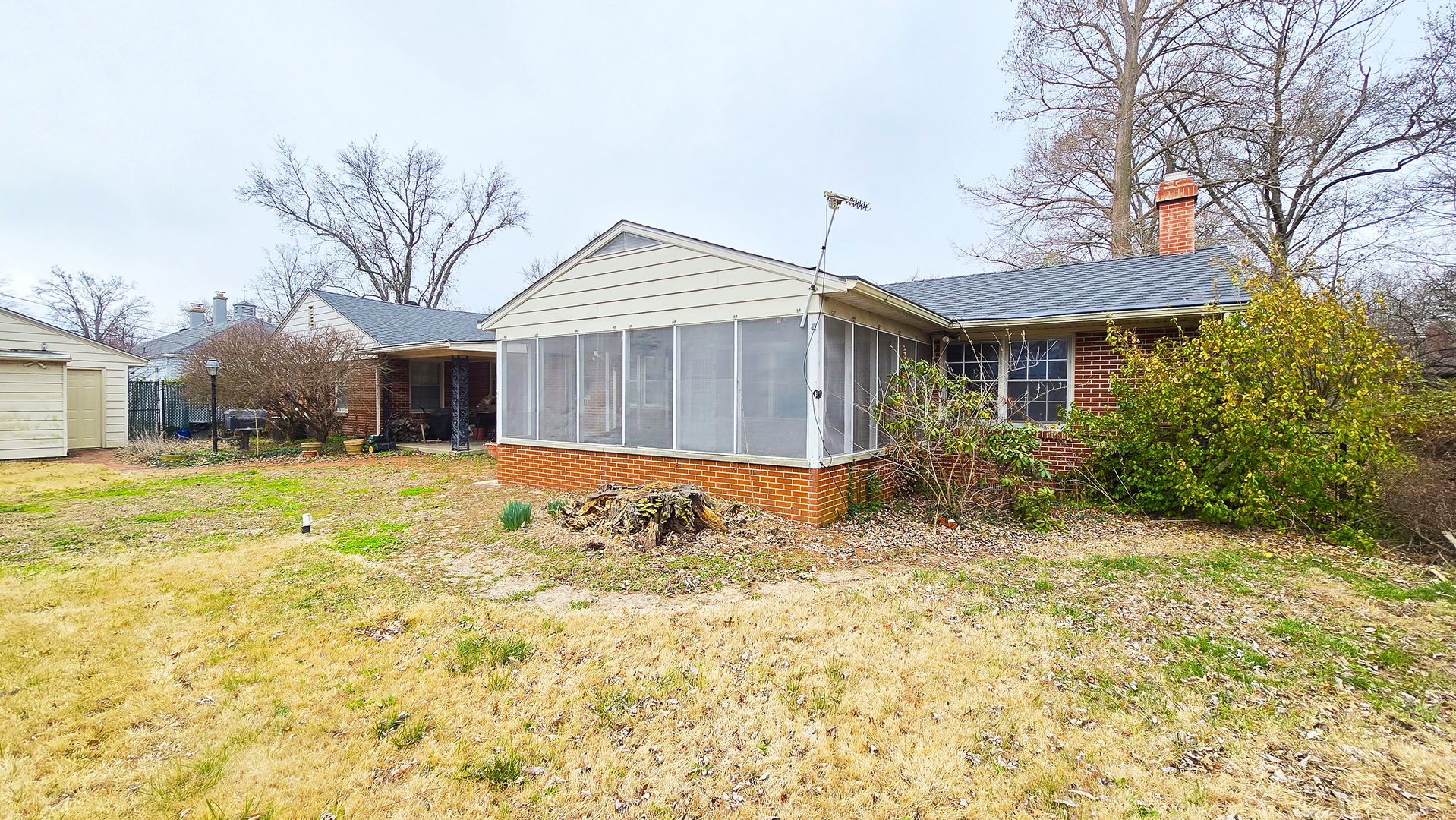 4 Lilac Lane Centralia, IL 62801 - Photo 31 of 32 a view of a house with a large tree and wooden fence