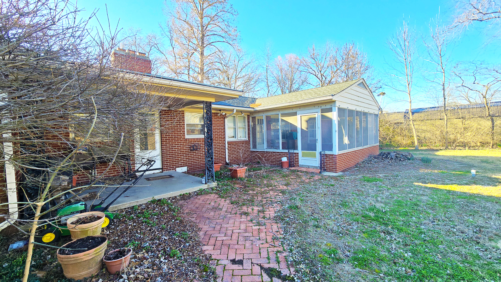 4 Lilac Lane Centralia, IL 62801 - Photo 32 of 32 a view of a house with a backyard and sitting area