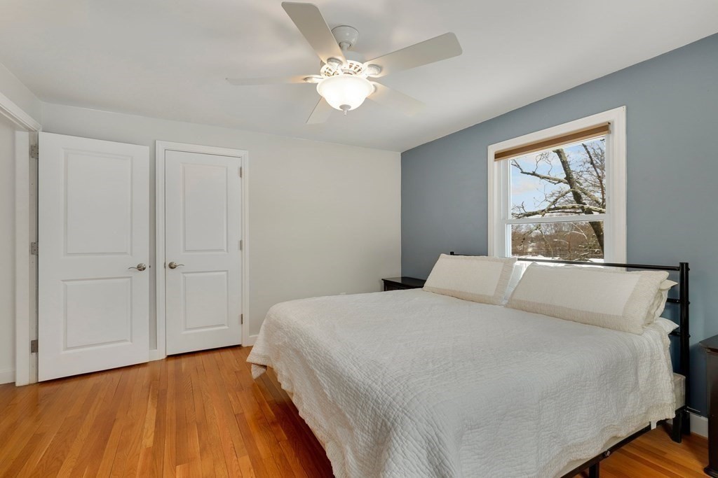 43 Montview Road Chelmsford, MA 01824 - Photo 19 of 40 a bedroom with a large bed and a window